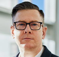 Portret van CEO Alexander Hughes, directeur van cryptohandelsbedrijf